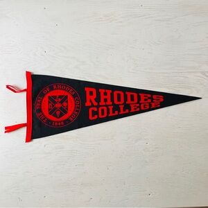 Rhodes College pennant. Approx: 12”x30”
Felt on felt.